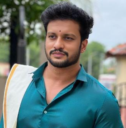 Naveen R